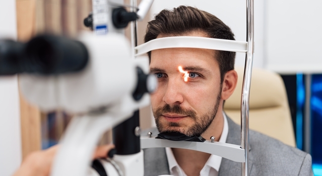 young man at an eye exam